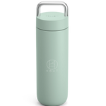 Mint chip cylindrical tumbler with a silver handle, featuring the brand 'KOHI'.