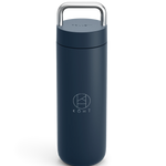 Stone blue cylindrical tumbler with a silver handle, featuring the brand 'KOHI'.